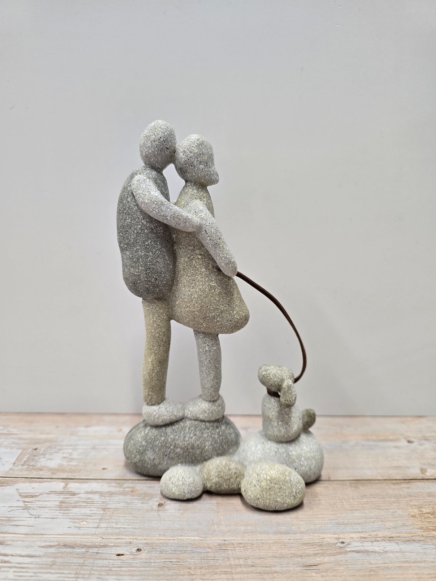 Stone Couple with Dog