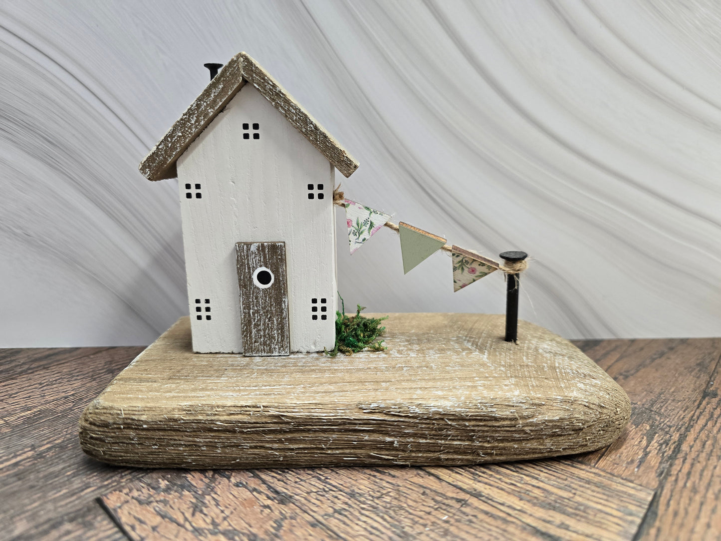 Wooden house with flag bunting