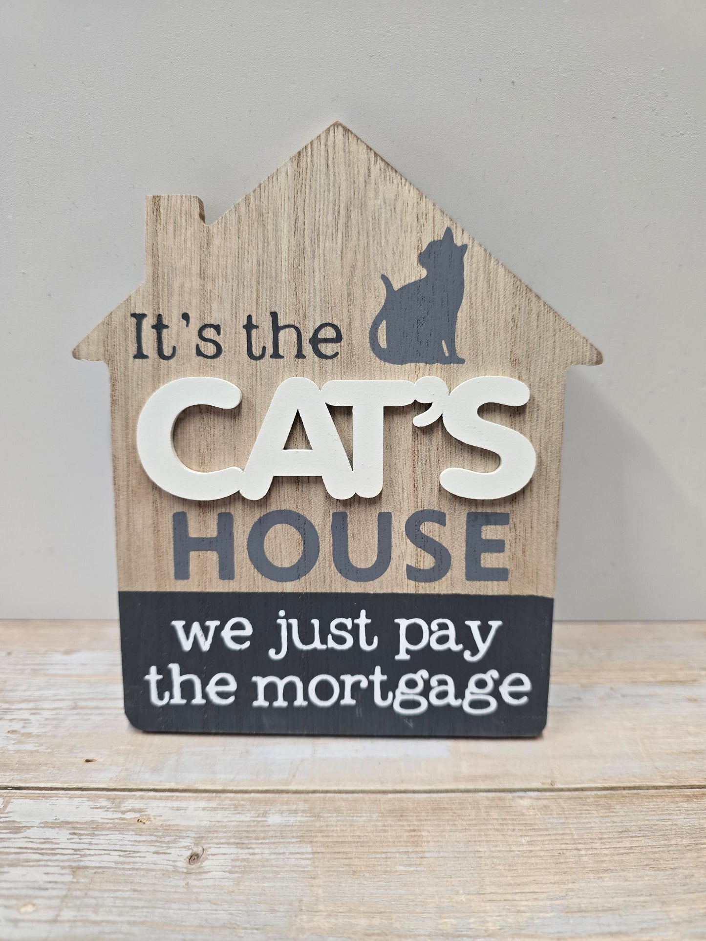 "It’s the cat's house we just pay the mortgage" Wood plaque