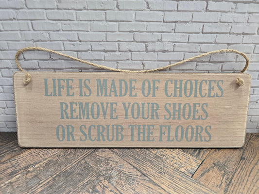 "Life is made of choices remove your shoes or scrub the floors" Wooden hanging plaque