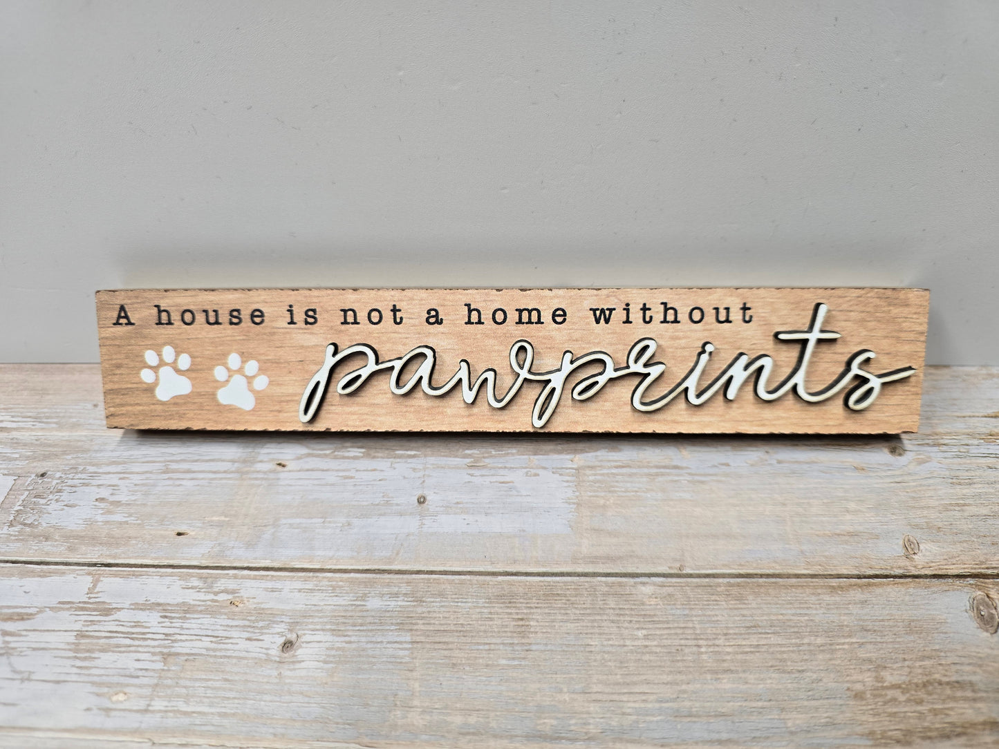 "A house is not a home without pawprints"