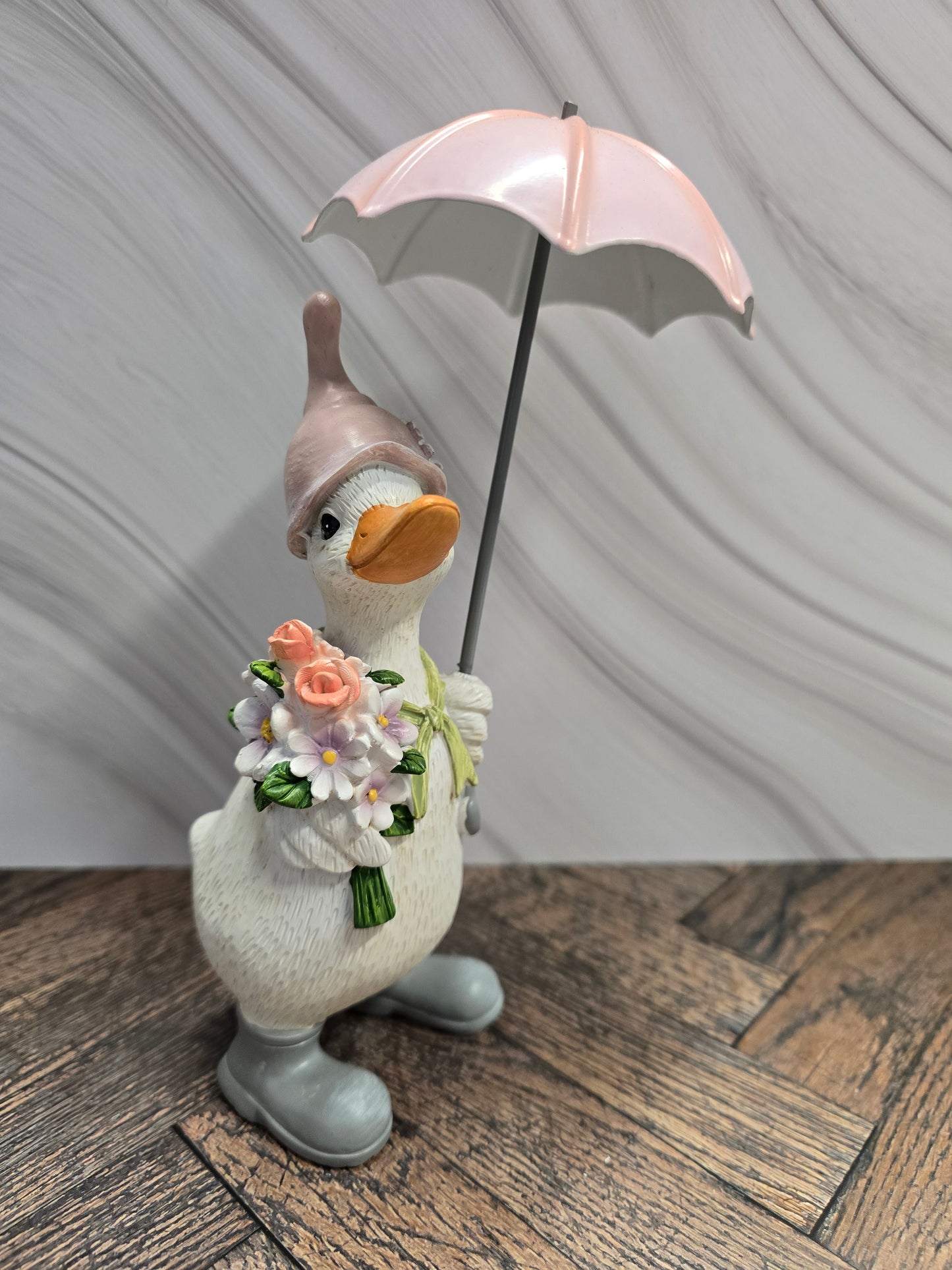 Umbrella Ducks with flower bouquet